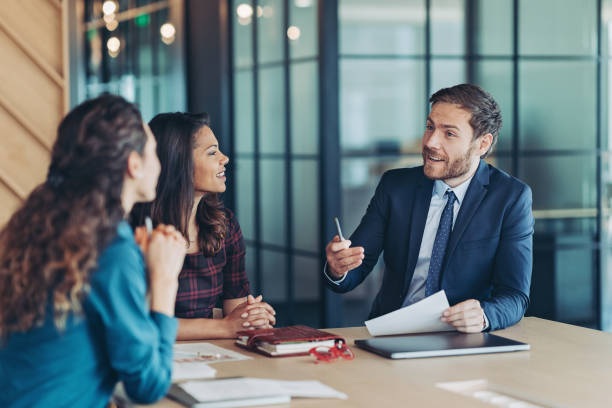 Home group of business persons during a meeting in the office